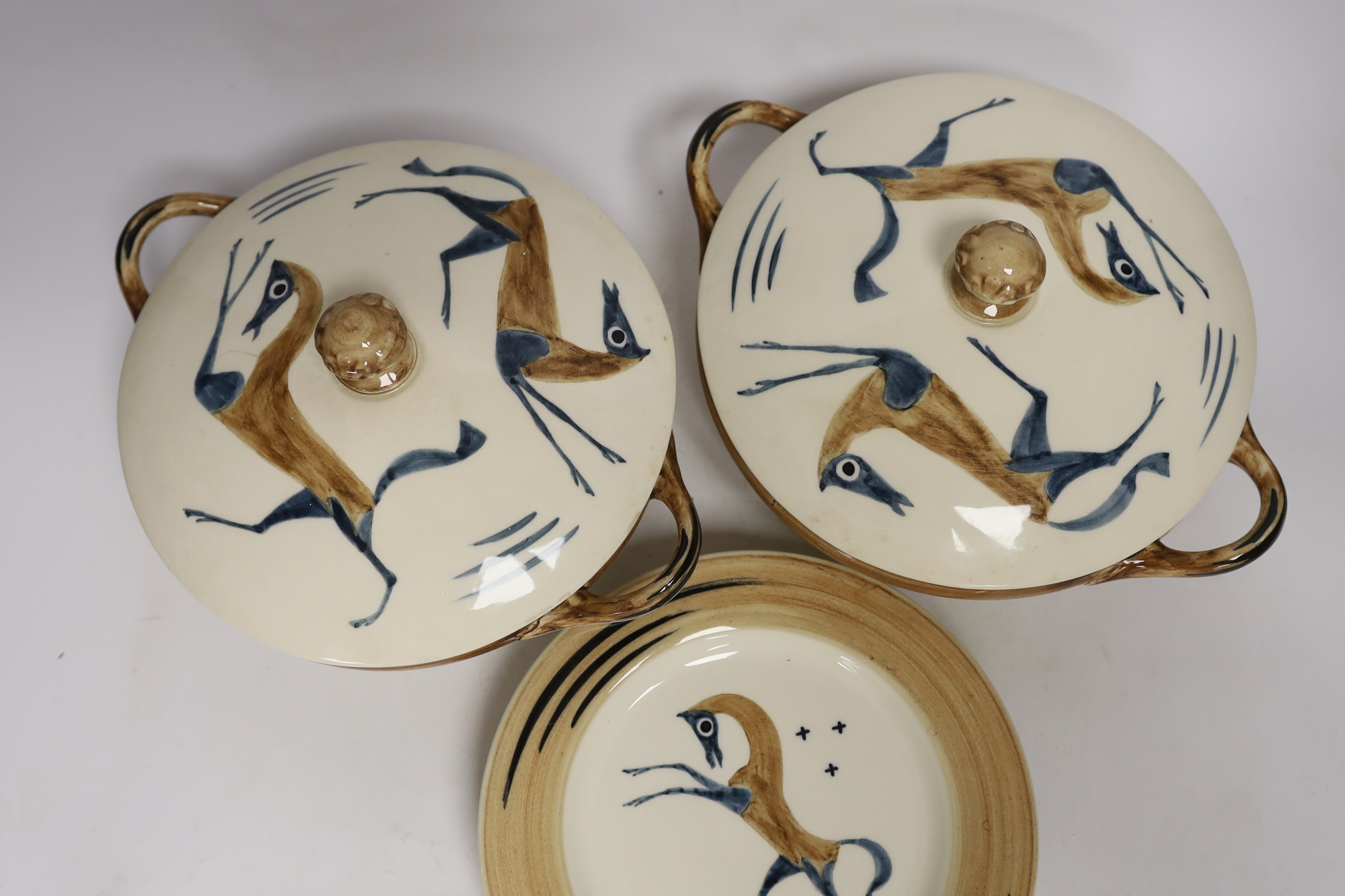 John Armstrong for Clarice Cliff, a pair of lidded two handled vegetable tureens and five dishes, painted with the ‘’Chaldean’’ pattern, produced for the Harrods and Art in Industry Exhibitions, in 1934